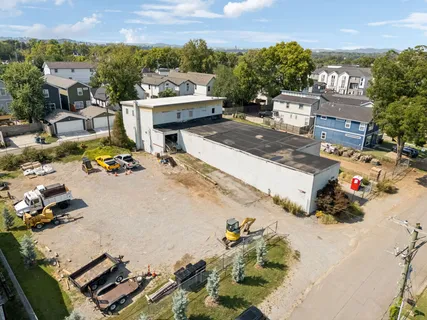 a view of a terrace with wooden floor and a ocean view