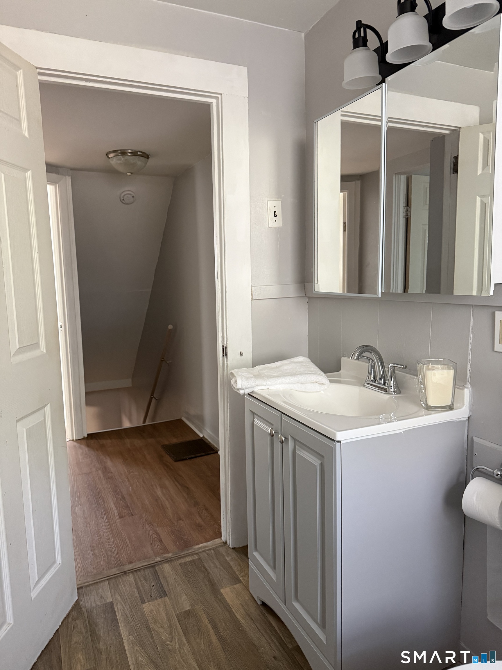8 Rogers Place Manchester, CT 06040 - Photo 13 of 16 a bathroom with a sink and a mirror