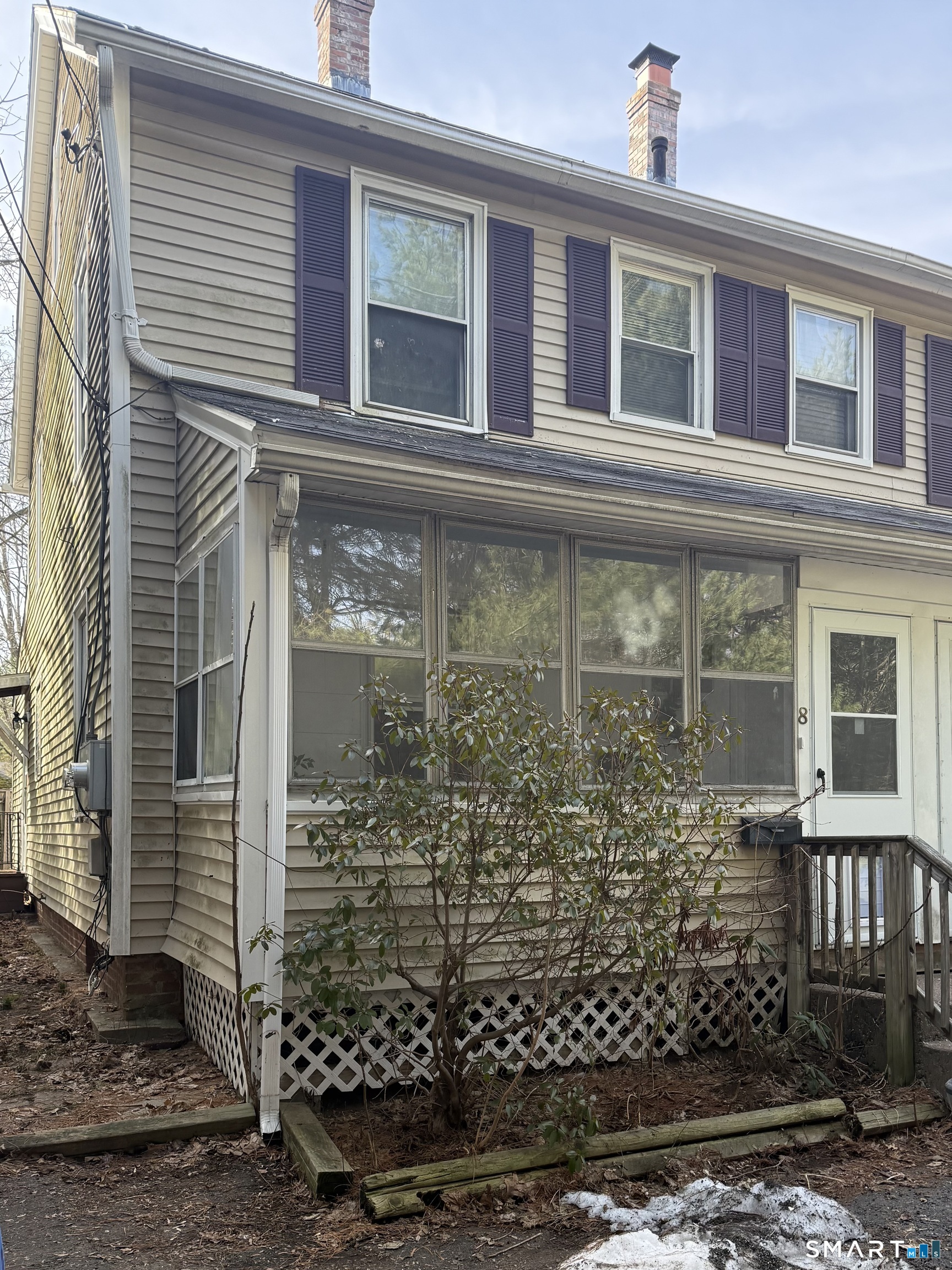 8 Rogers Place Manchester, CT 06040 - Photo 3 of 16 a front view of a house with a yard