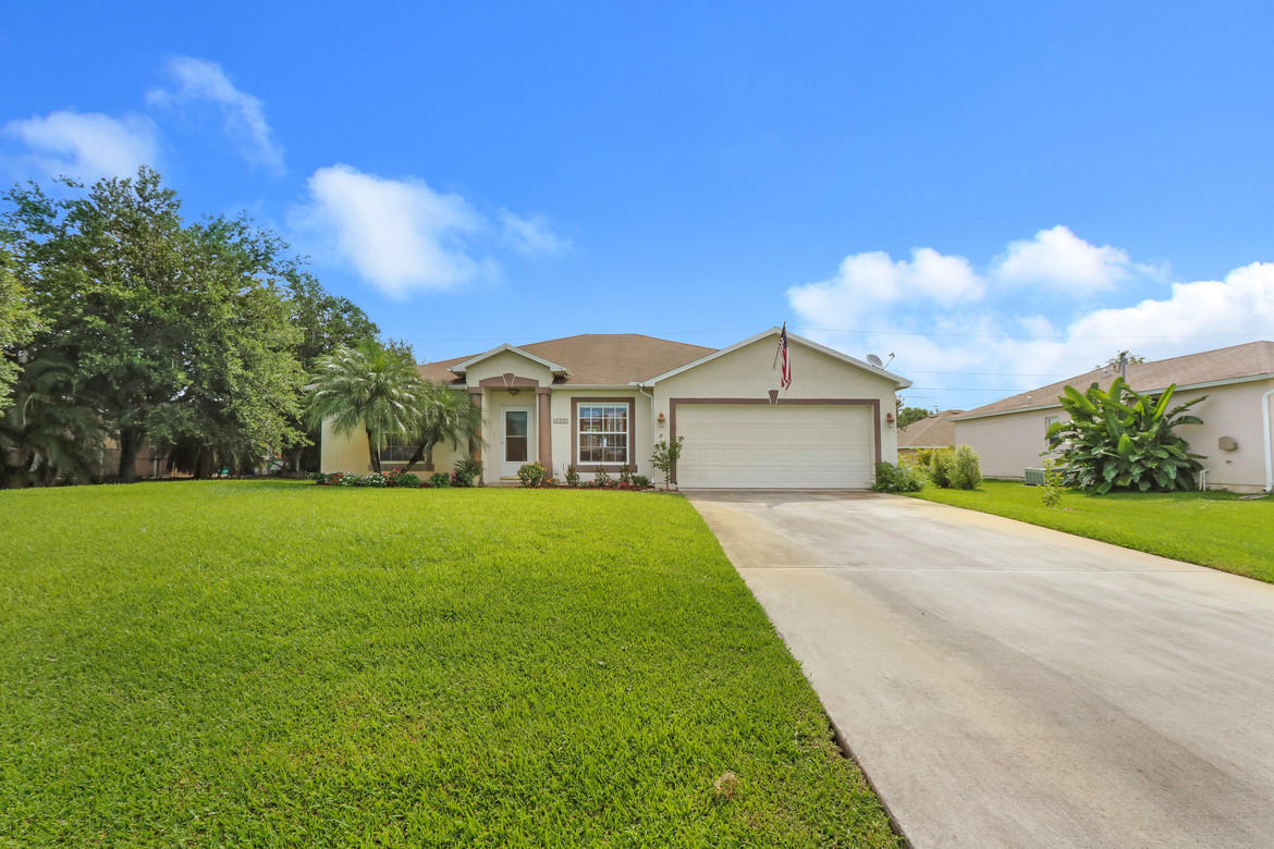 4325 Southwest Appleseed Road Port St. Lucie, FL 34953 - Photo 1 of 17 Appleseed front