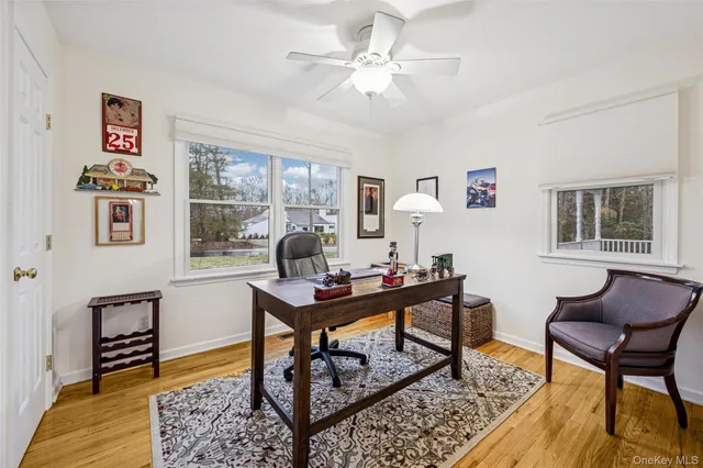 a bedroom with bed and a window