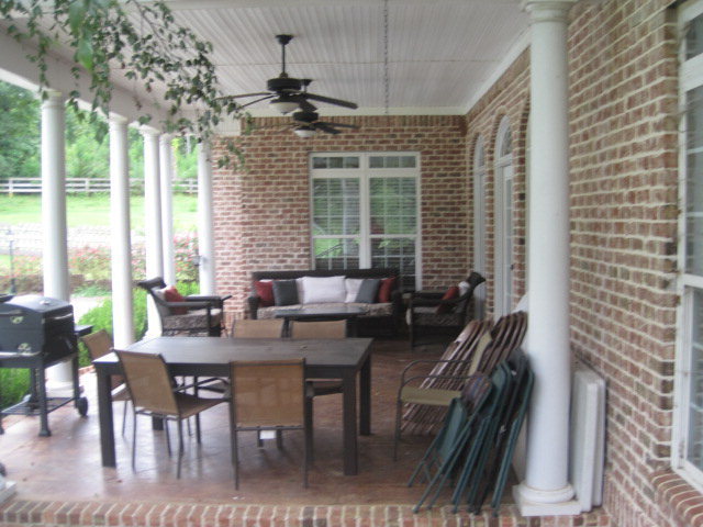 9185 Estes Road Macon, GA 31220 - Photo 16 of 20 a view of a dining room with furniture window and outside view