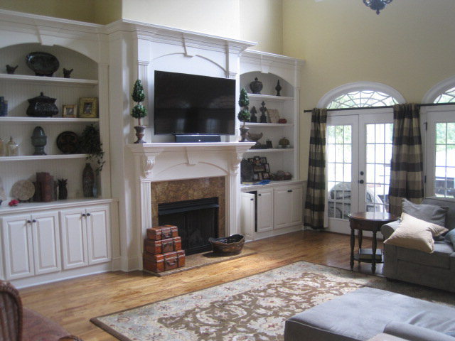 9185 Estes Road Macon, GA 31220 - Photo 4 of 20 a living room with furniture a flat screen tv and a fireplace