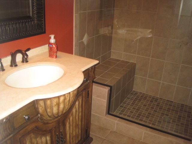 9185 Estes Road Macon, GA 31220 - Photo 10 of 20 a bathroom with a sink toilet and shower
