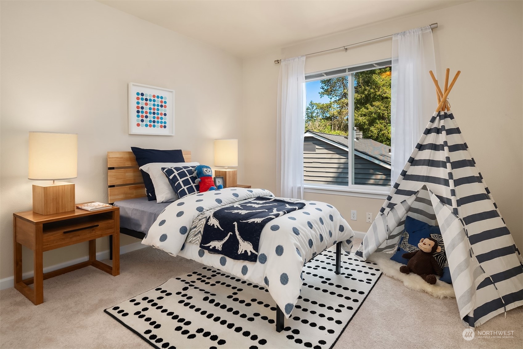 2017 Northeast 27th Street Renton, WA 98056 - Photo 21 of 27 a bedroom with a bed and a window