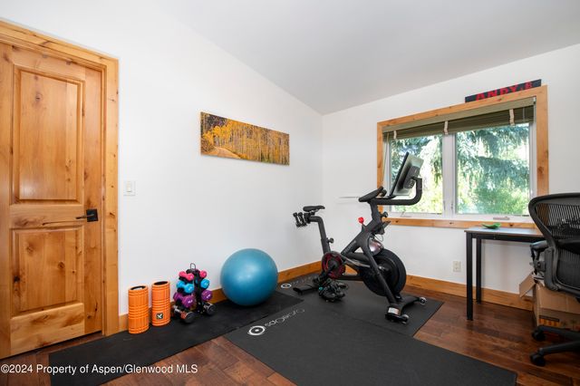 a view of a room with gym equipment