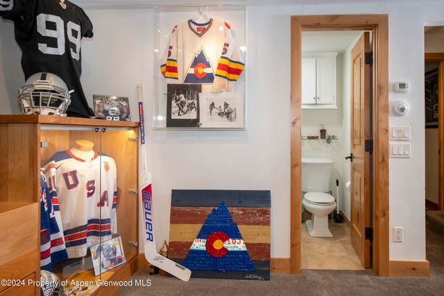 a room with toys and wall paintings