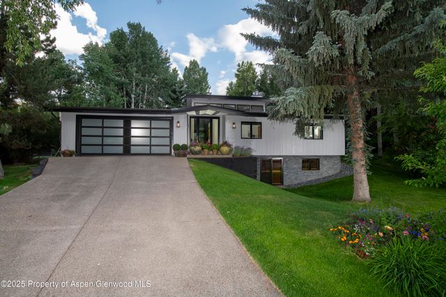 a view of house with outdoor space and deck