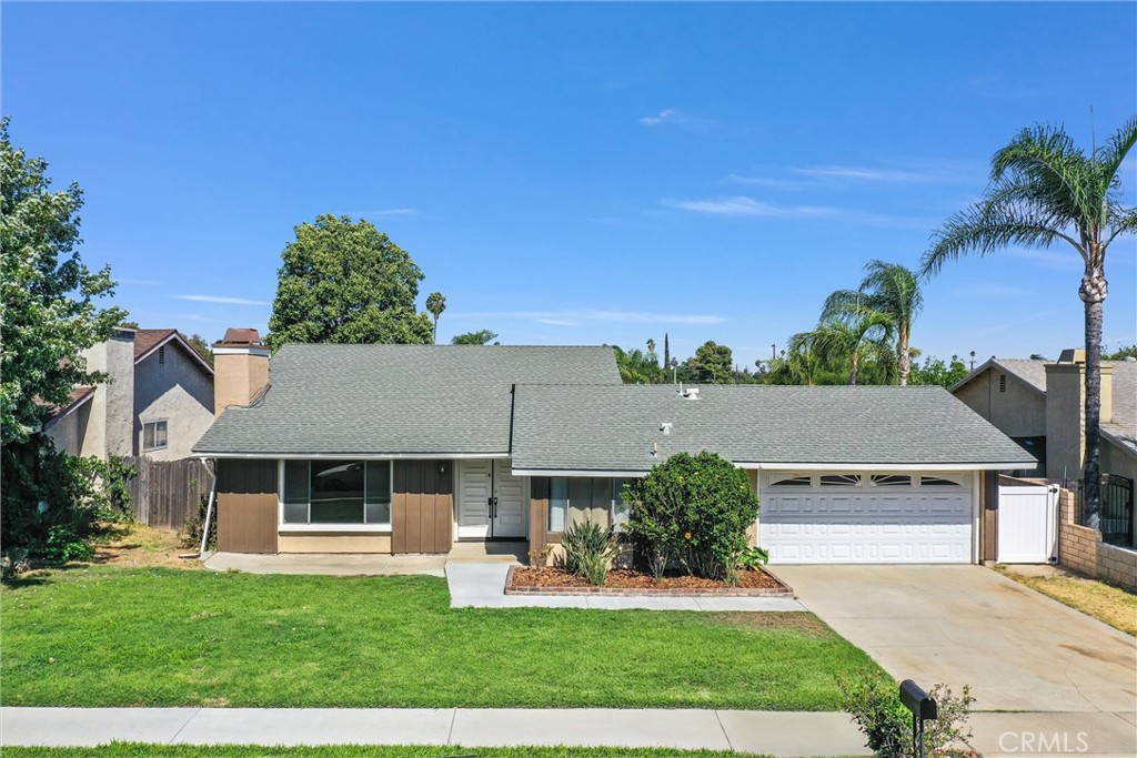 7947 Winery Ridge Drive Rancho Cucamonga, CA 91730 - Photo 1 of 1 front view of house with a yard