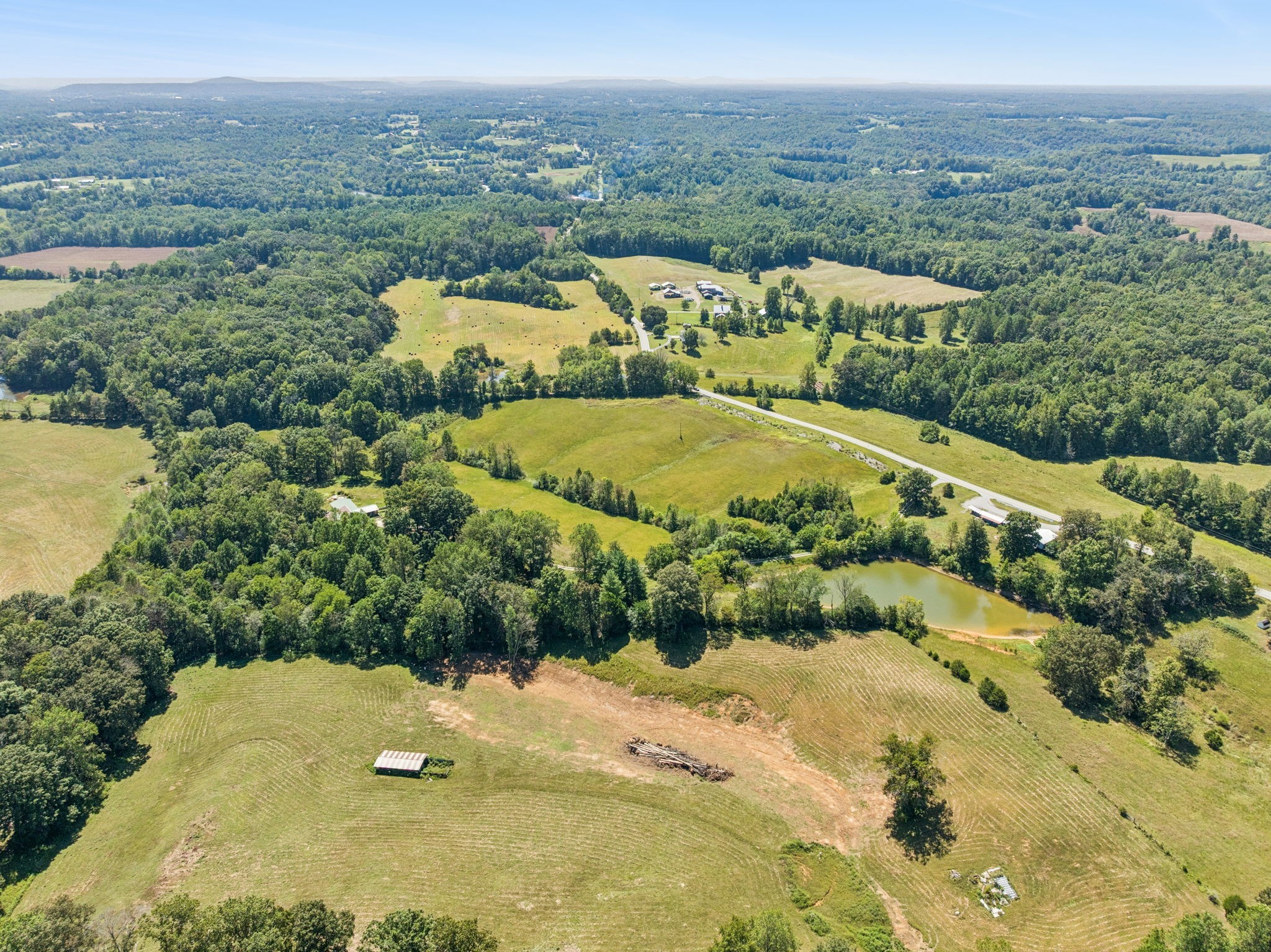 8272 Burgess Falls Road Baxter, TN 38544 - Photo 15 of 41 a view of a lake with a mountain