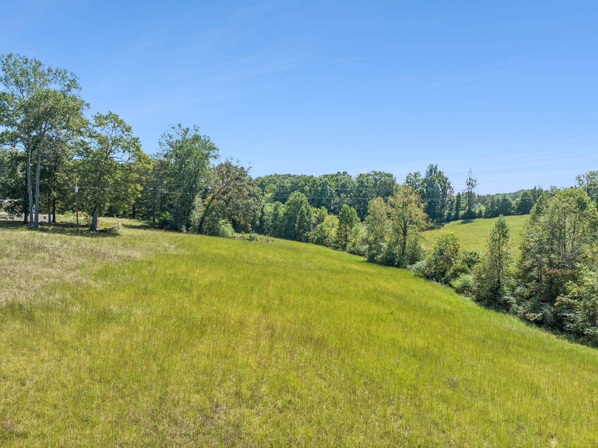 8272 Burgess Falls Road Baxter, TN 38544 - Photo 20 of 41 a view of a field with an outdoor space