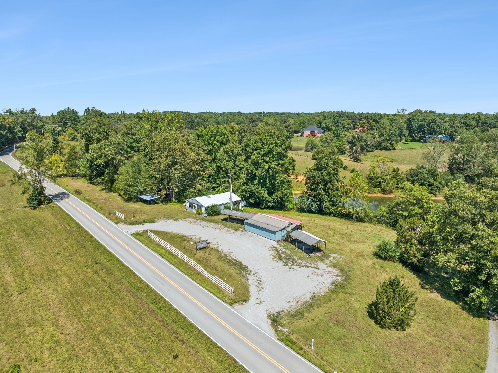 8272 Burgess Falls Road Baxter, TN 38544 - Photo 33 of 41 a view of a swimming pool with a yard