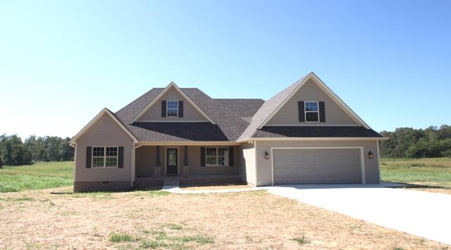 502 Taylor Road Manchester, TN 37355 - Photo 1 of 14 a front view of a house with a yard