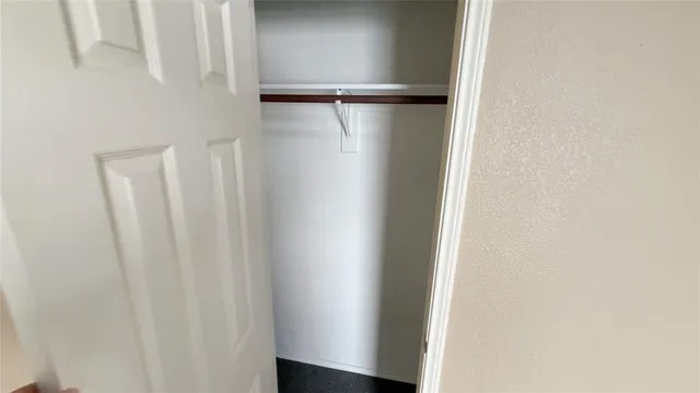 a bathroom with a sink toilet vanity and tub