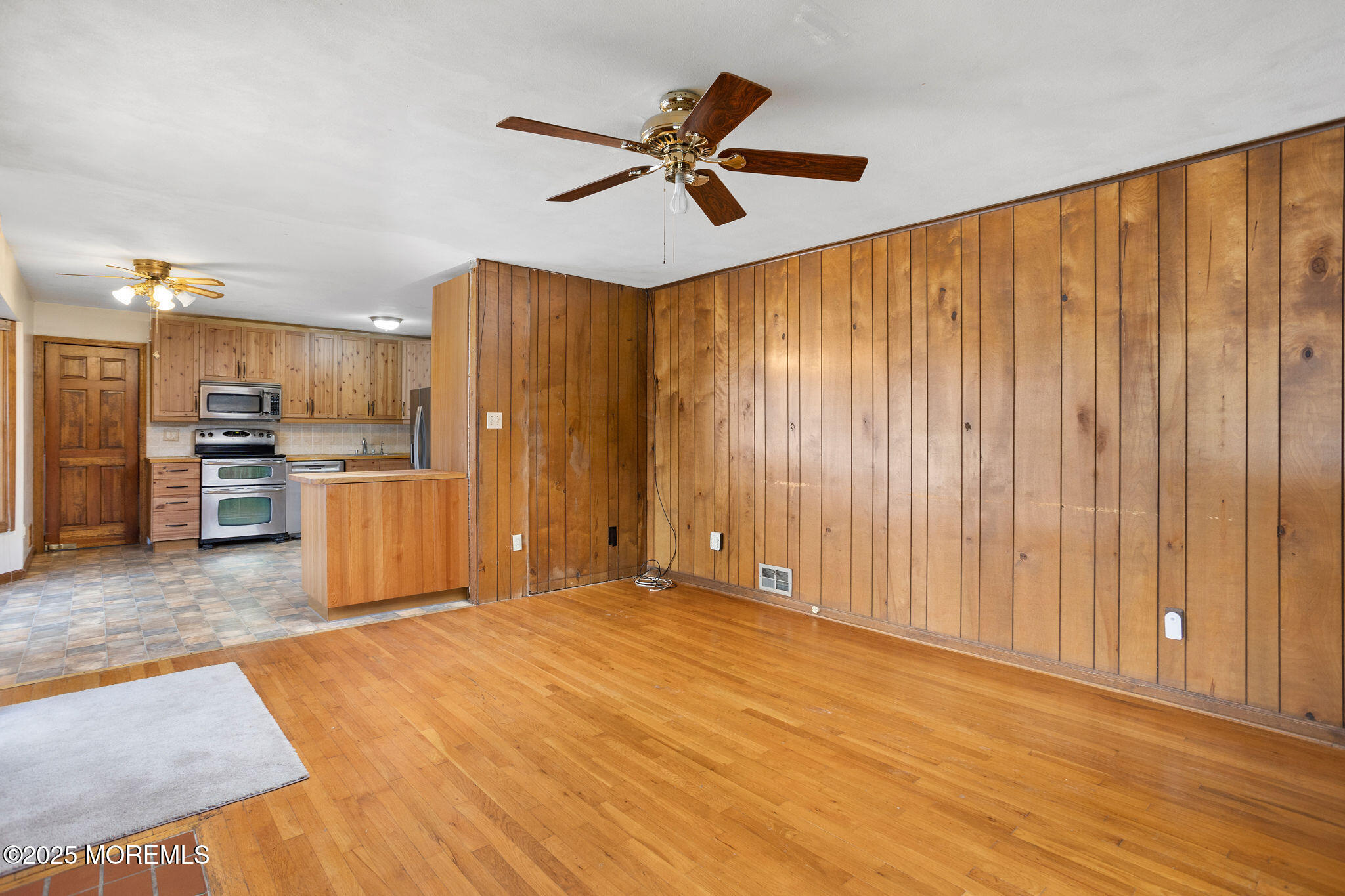 1 Hawk Drive Princeton Junction, NJ 08550 - Photo 19 of 46 a view of a kitchen with a stove cabinets and wooden floor