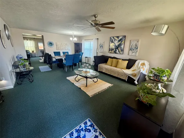 a living room with furniture and a table