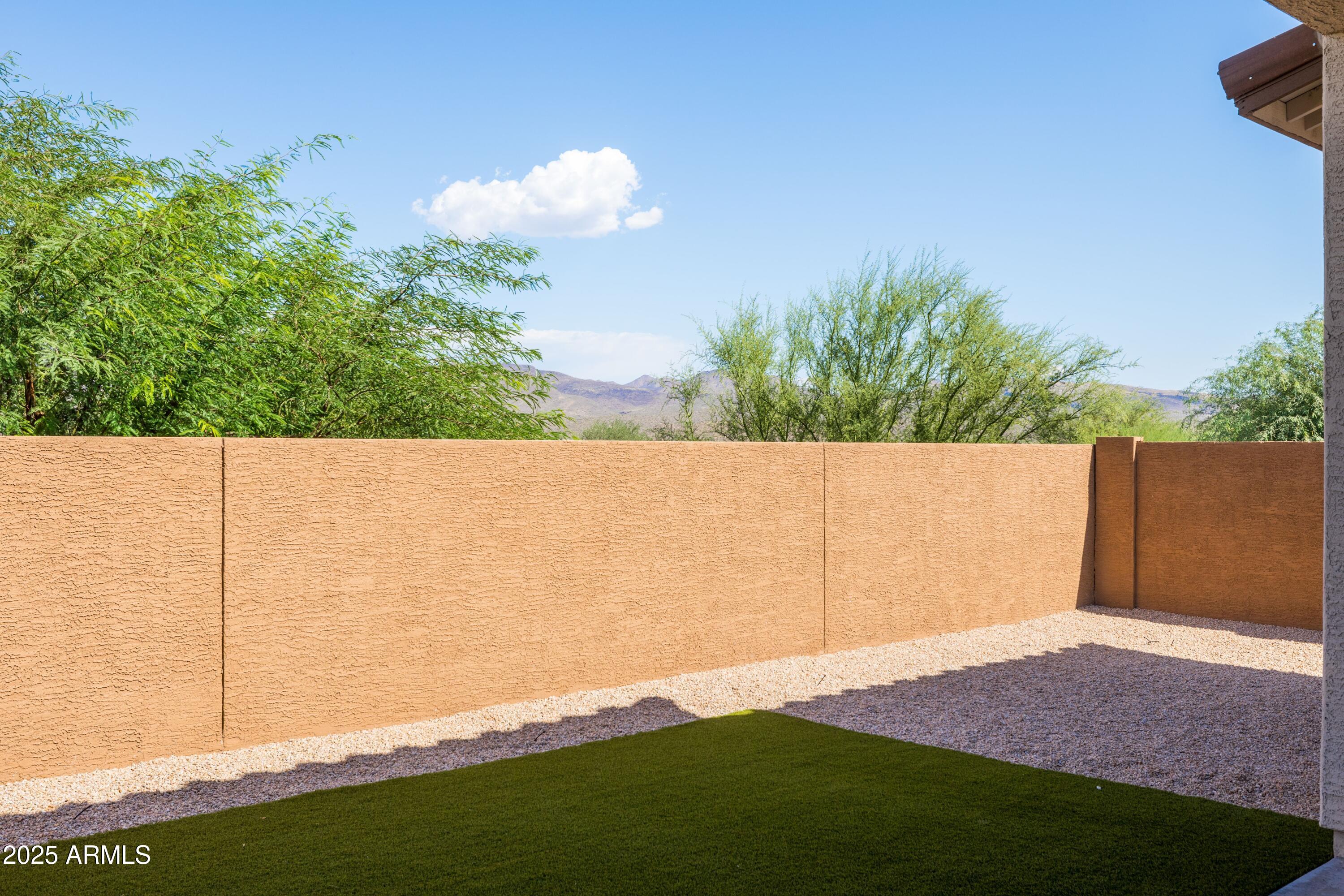 18788 East Blue Sky Drive Rio Verde, AZ 85263 - Photo 35 of 80 a view of an outdoor space and a yard