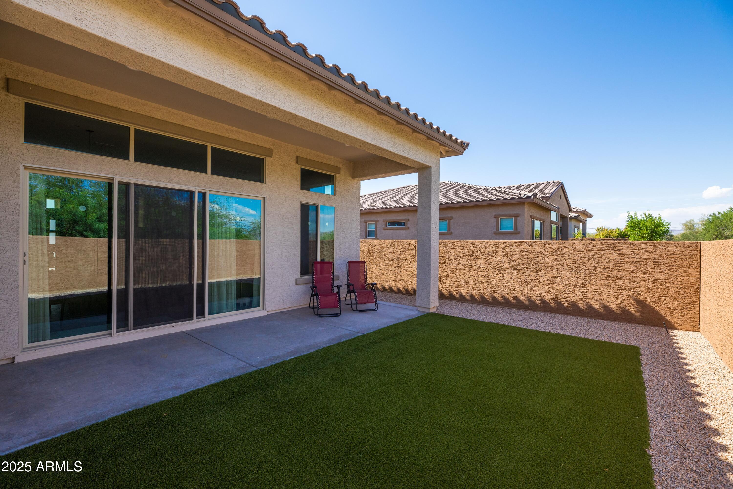 18788 East Blue Sky Drive Rio Verde, AZ 85263 - Photo 36 of 80 a view of a backyard with a garden and plants