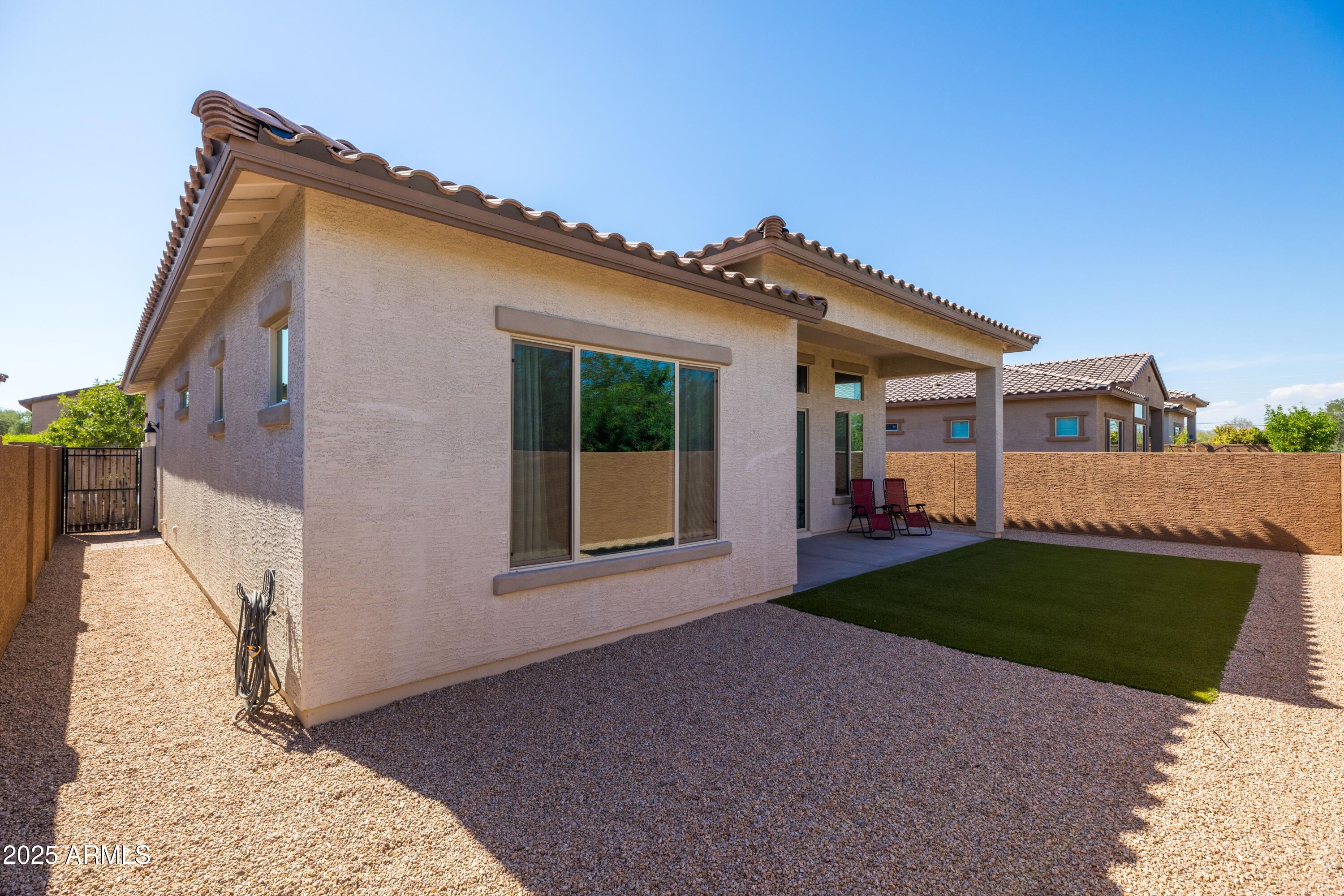 18788 East Blue Sky Drive Rio Verde, AZ 85263 - Photo 39 of 80 front view of a house with a yard