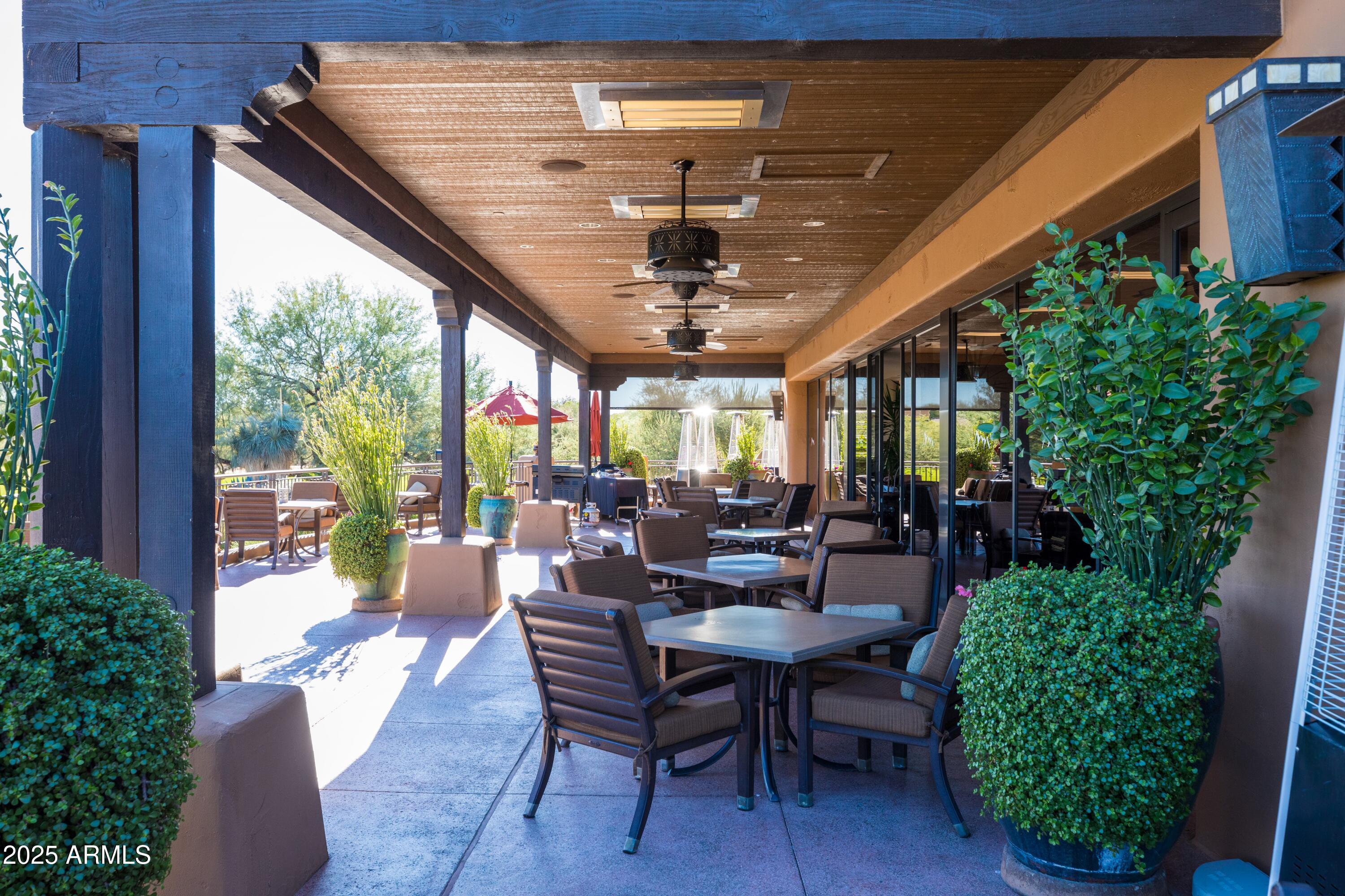 18788 East Blue Sky Drive Rio Verde, AZ 85263 - Photo 59 of 80 a view of a dining room with furniture window and outside view