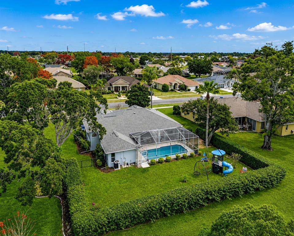 14178 Pullman Drive Spring Hill, FL 34609 - Photo 3 of 46 an aerial view of a house with a garden