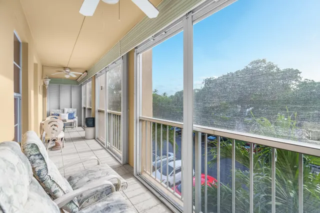 a patio with a patio table and chairs