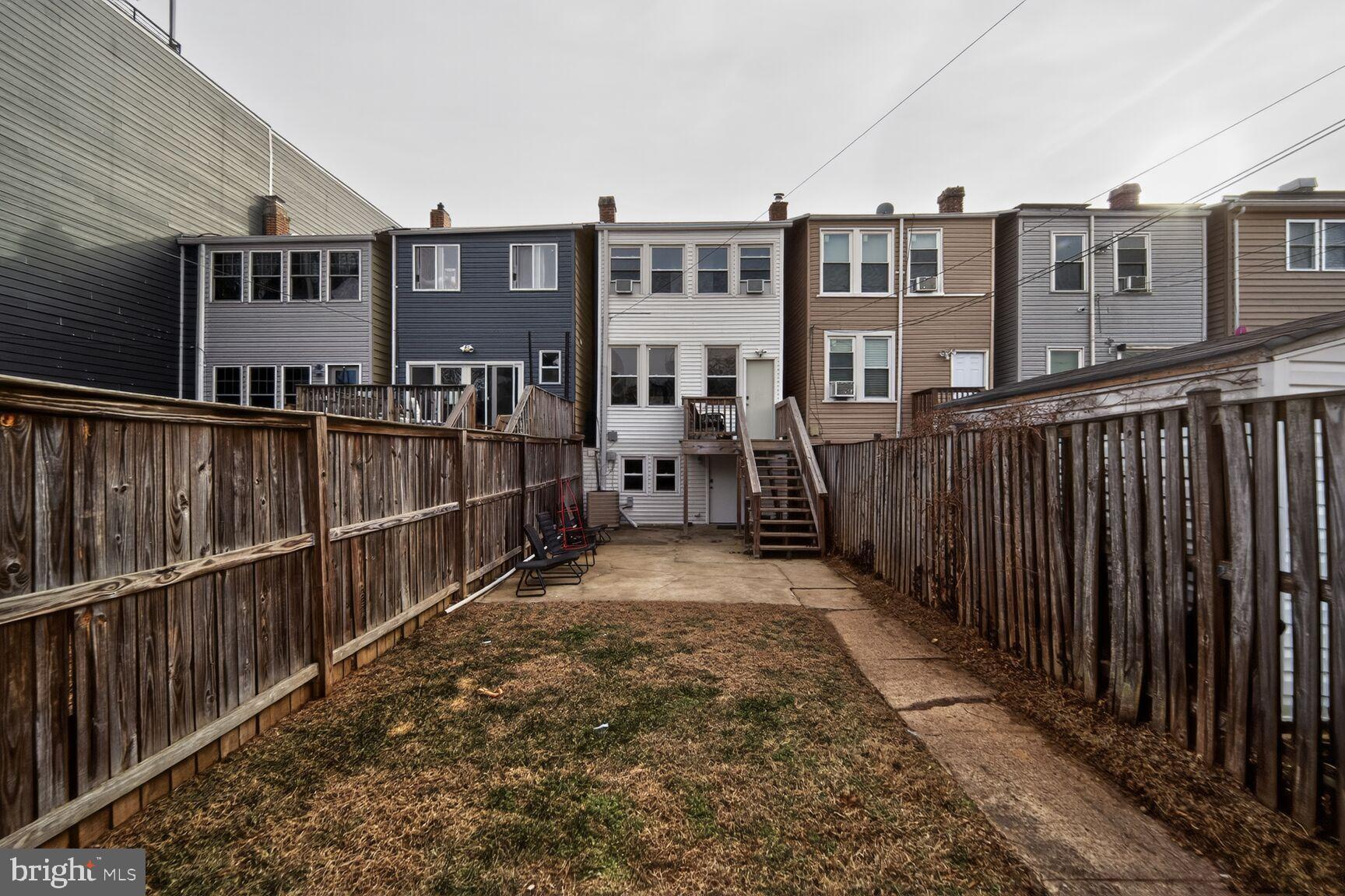 632 Franklin Street Northeast Washington, DC 20017 - Photo 14 of 19 a view of a balcony with wooden fence