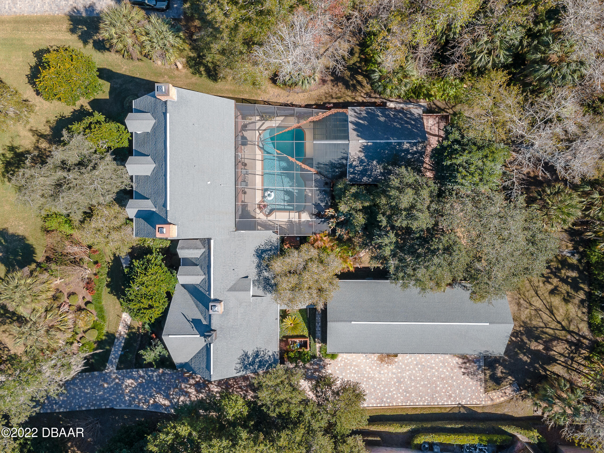 8 Moss Point Drive Ormond Beach, FL 32174 - Photo 6 of 63 an aerial view of a house with a yard