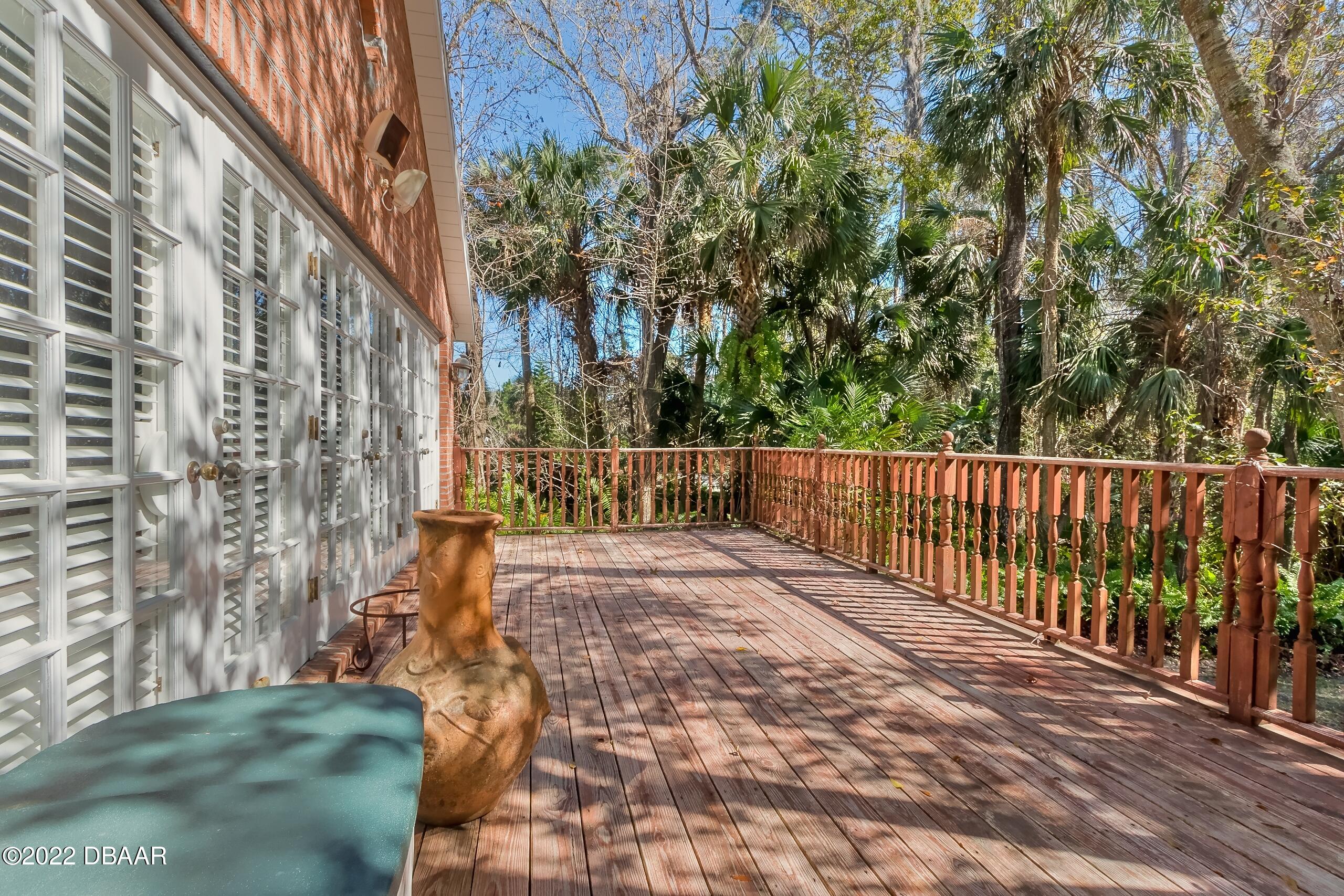 8 Moss Point Drive Ormond Beach, FL 32174 - Photo 61 of 63 a view of a pathway both side of building