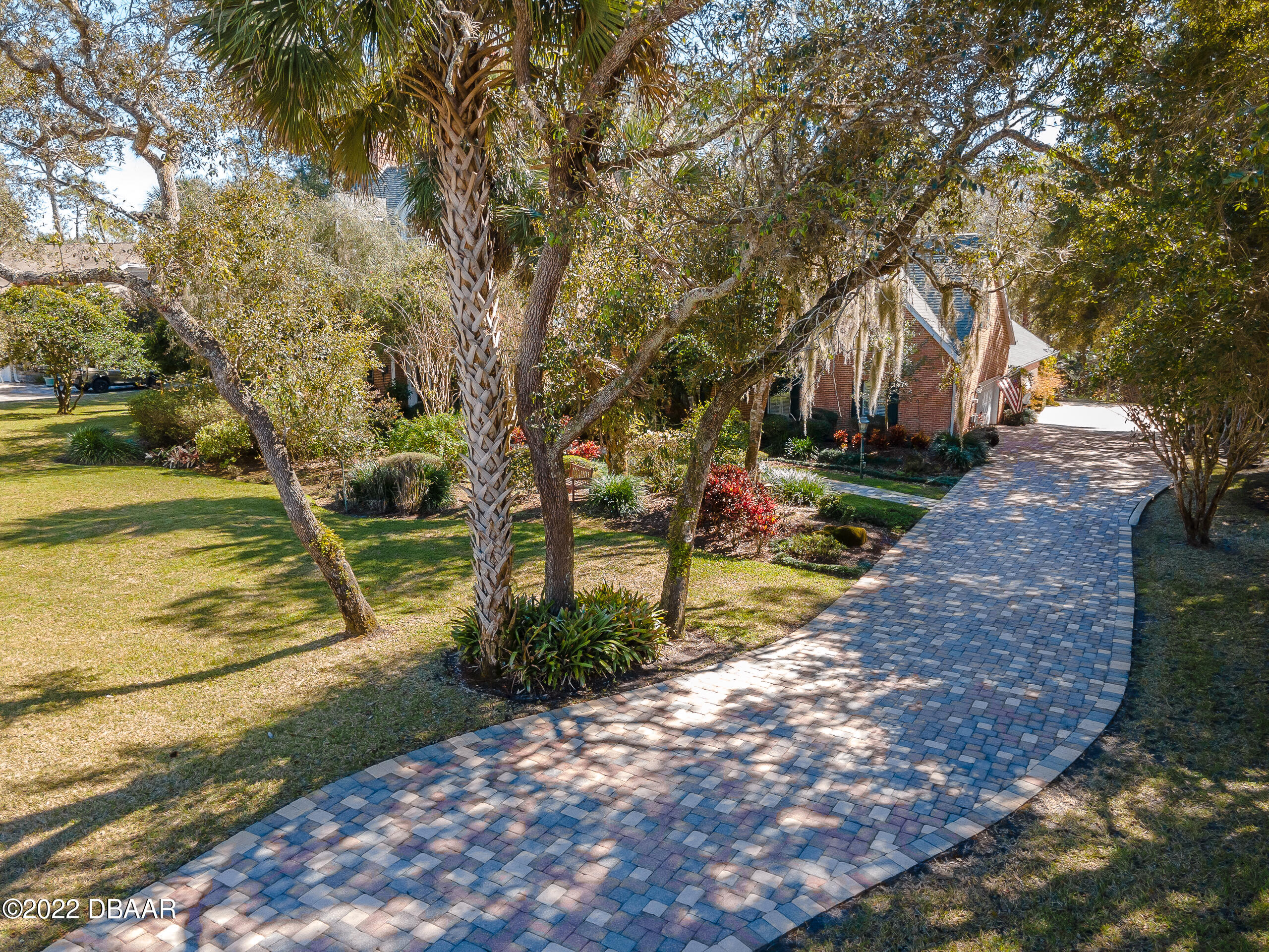8 Moss Point Drive Ormond Beach, FL 32174 - Photo 9 of 63 a view of a park with large trees
