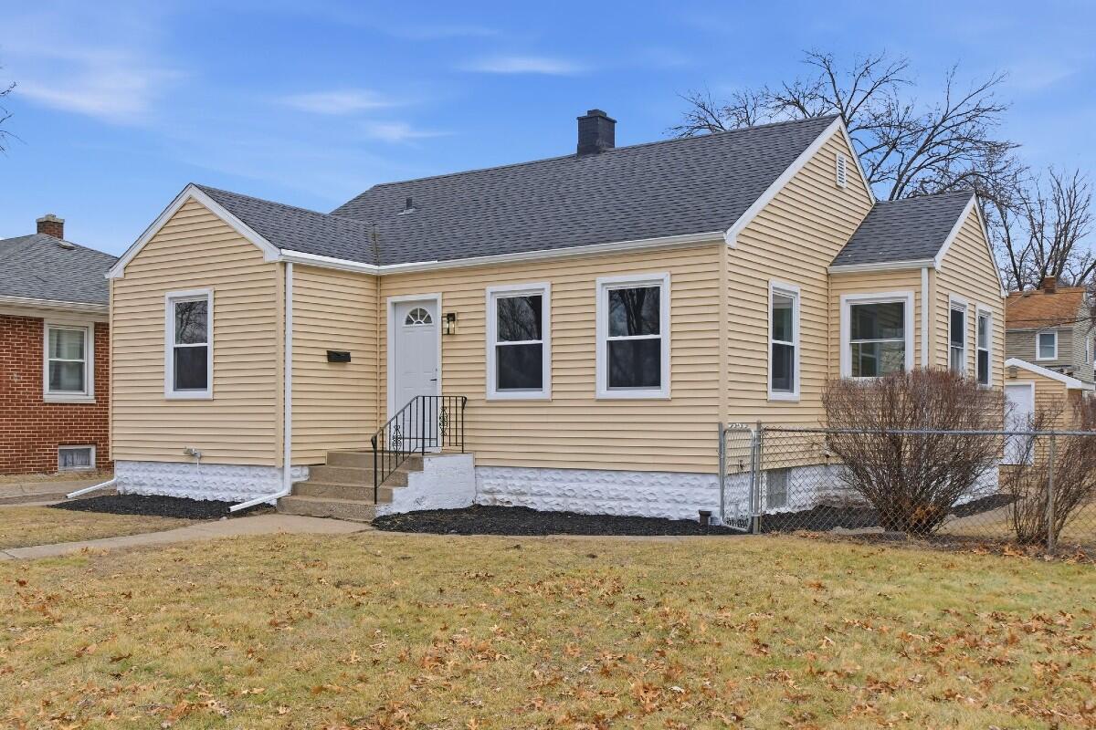 423 Cline Avenue Griffith, IN 46319 - Photo 1 of 33 a view of a house with snow