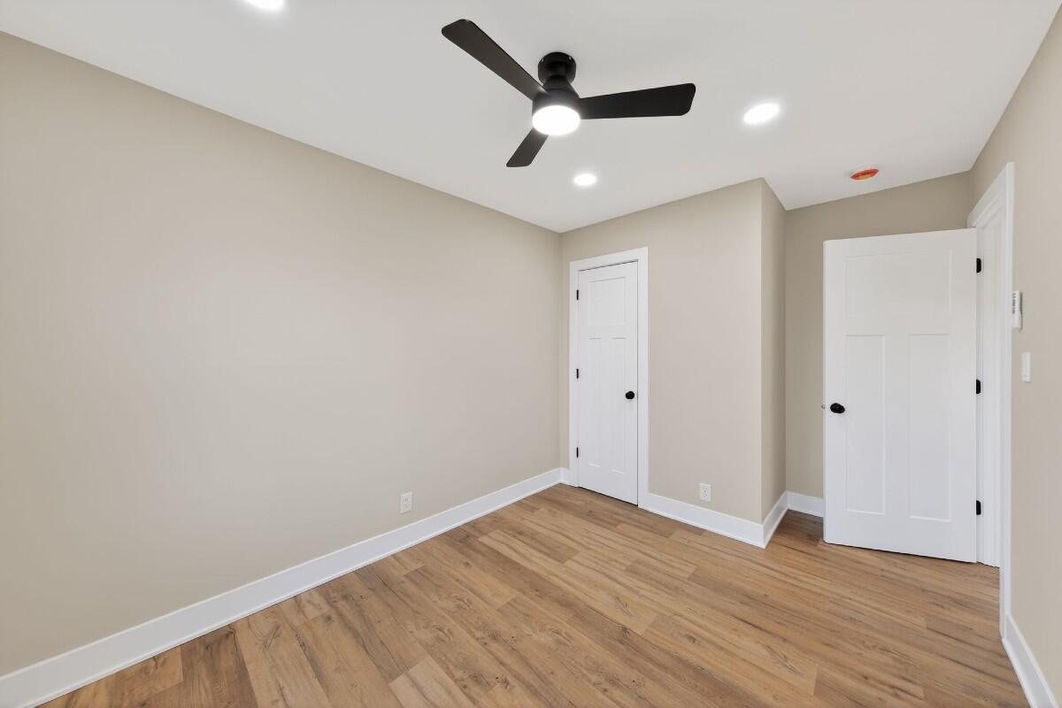 423 Cline Avenue Griffith, IN 46319 - Photo 15 of 33 a view of empty room with wooden floor
