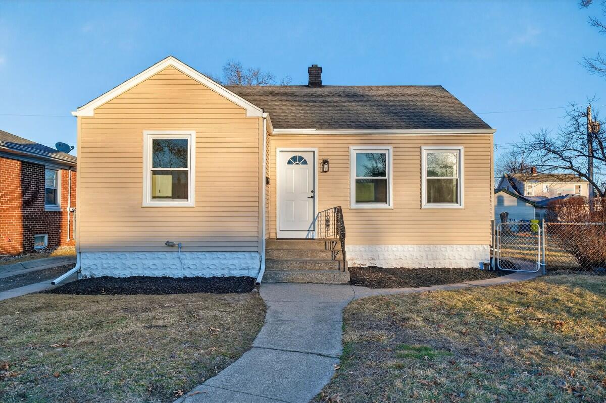 423 Cline Avenue Griffith, IN 46319 - Photo 24 of 33 a front view of a house with street