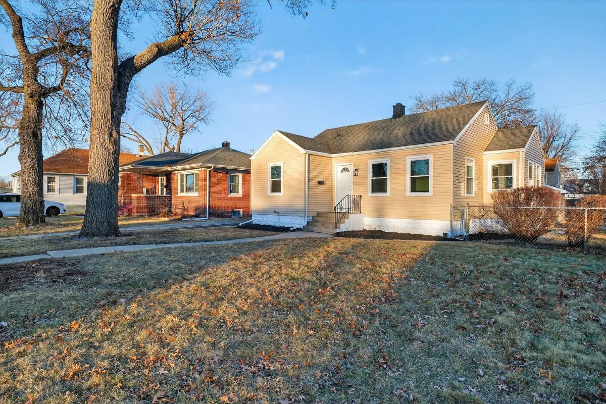 423 Cline Avenue Griffith, IN 46319 - Photo 25 of 33 front view of a house with a yard