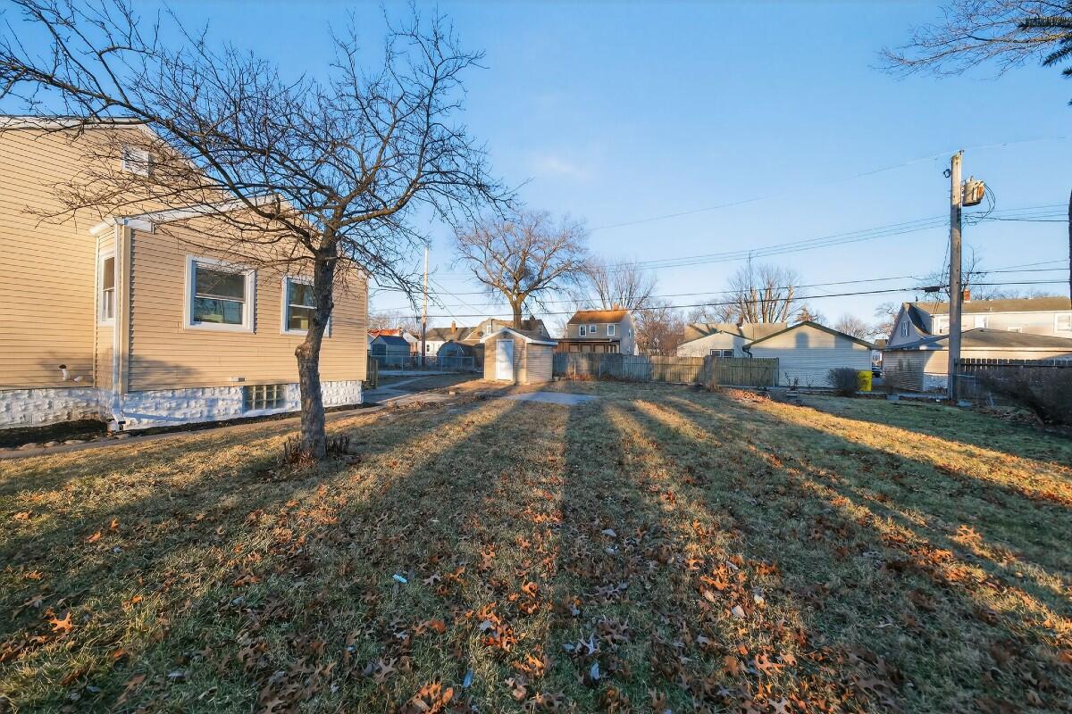 423 Cline Avenue Griffith, IN 46319 - Photo 33 of 33 a view of a yard with a house
