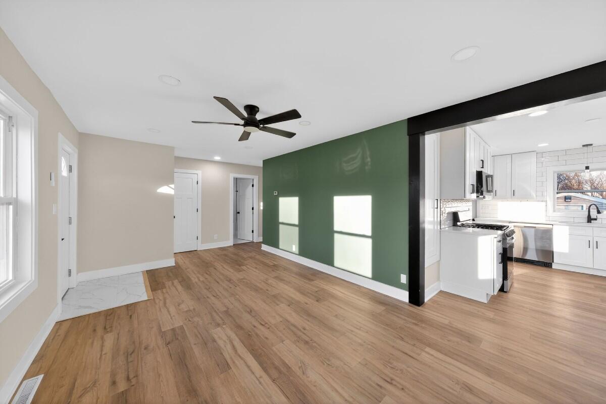 423 Cline Avenue Griffith, IN 46319 - Photo 4 of 33 a view of a kitchen with a sink and a window