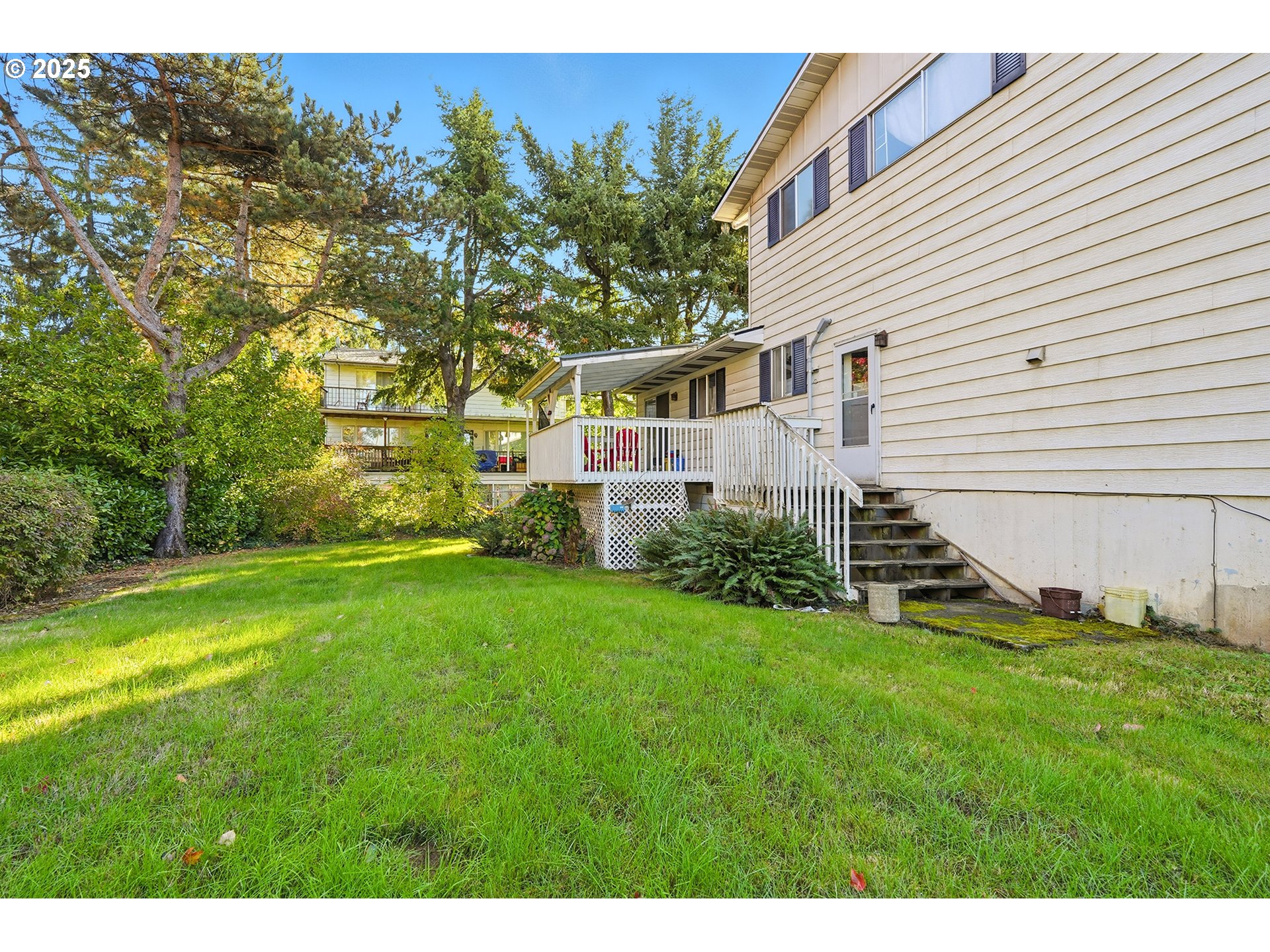 4151 Northeast 8th Street Gresham, OR 97030 - Photo 9 of 33 a view of a house with a backyard