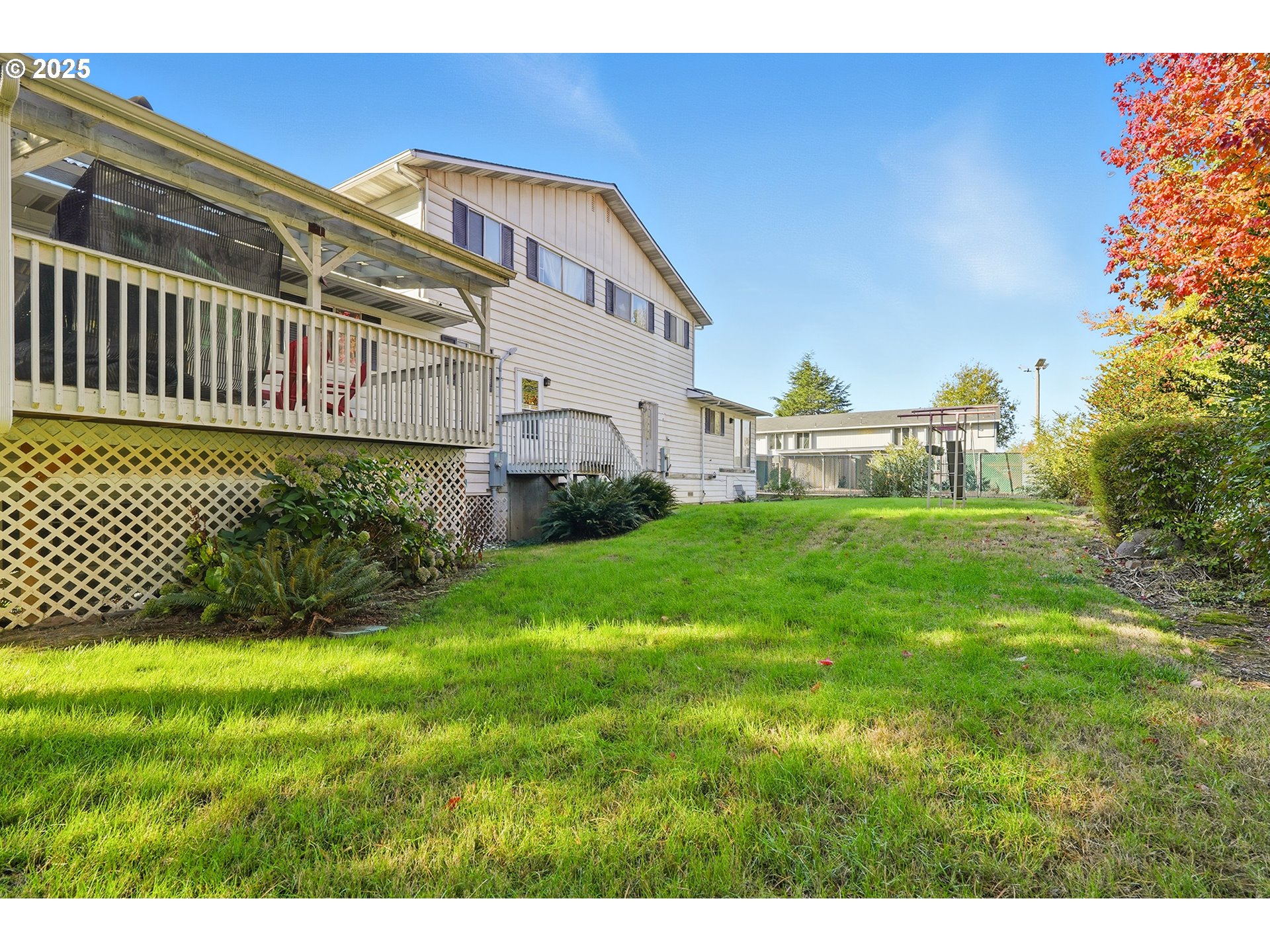 4151 Northeast 8th Street Gresham, OR 97030 - Photo 10 of 33 a view of a house with a yard