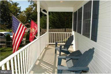152 Spring Path Arnold, MD 21012 - Photo 2 of 30 Relax on the sunny front porch.