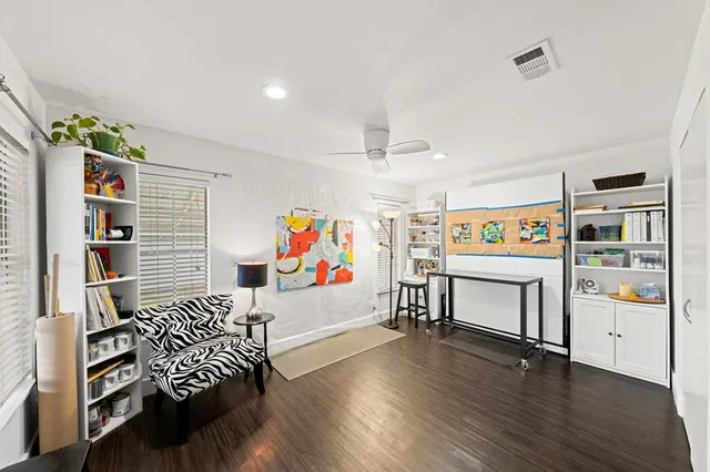 a view of a deck with furniture and a yard