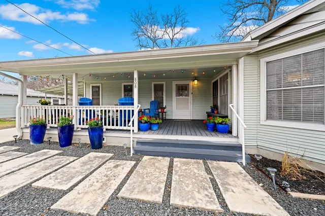 a view of a house with a porch