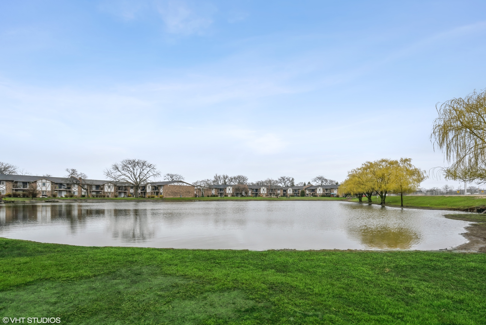 9s070 South Frontage Road, Unit 204 Willowbrook, IL 60527 - Photo 15 of 18 a view of a lake with houses