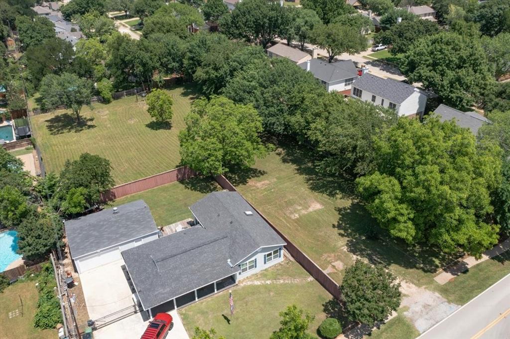 1000 Hughes Road Grapevine, TX 76051 - Photo 14 of 15 an aerial view of a house with a yard and lake view