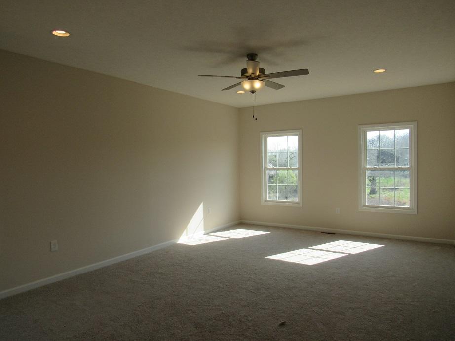 4441 Old Stage Road Radford, VA 24141 - Photo 13 of 32 a view of empty room with window and ceiling fan