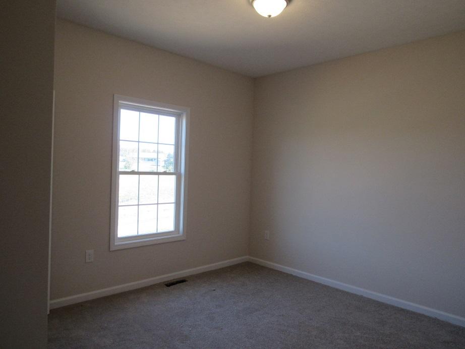 4441 Old Stage Road Radford, VA 24141 - Photo 18 of 32 an empty room with a window