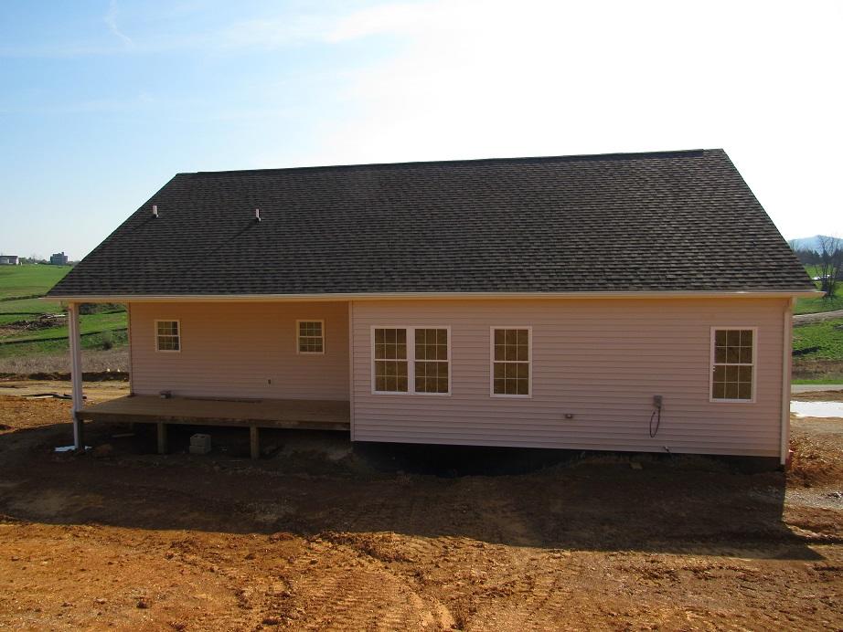 4441 Old Stage Road Radford, VA 24141 - Photo 29 of 32 a front view of a house with a yard