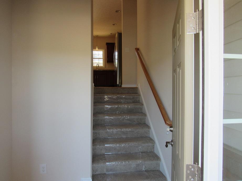 4441 Old Stage Road Radford, VA 24141 - Photo 4 of 32 a view of an entryway with wooden floor