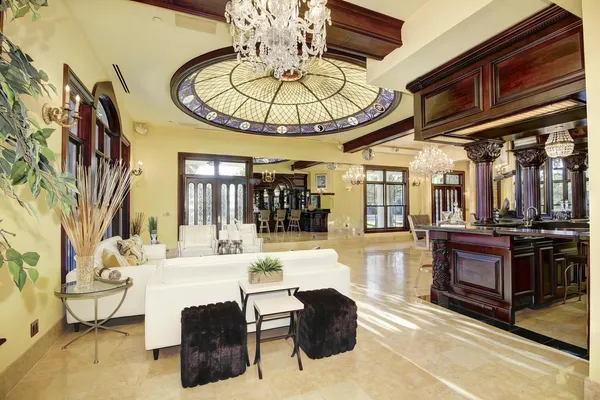 a view of an entryway with wooden floor and windows