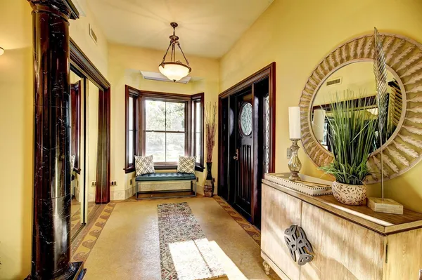 a view of balcony with wooden floor