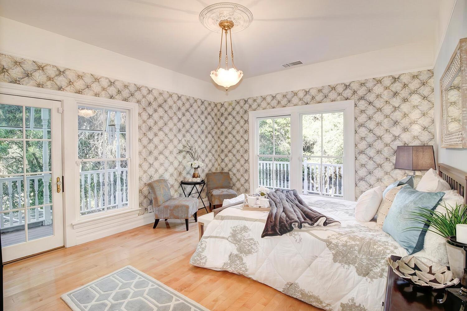4434 Mapel Lane Carmichael, CA 95608 - Photo 39 of 72 a living room with furniture and a floor to ceiling window
